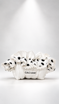A white ruffled fabric bag with black polka dots and lace trim, featuring a white label that reads 'GACIAMI', set against a bright white studio background with a spotlight effect.